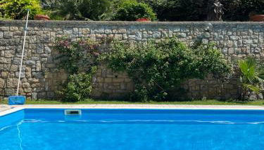 affascinante bilocale con piscina - Photo 2