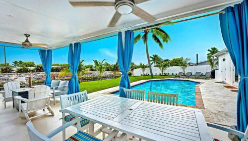 NEW Waterfront Tropic Oasis - Heated Pool, Canal, Dock, Air Hockey - Foto 4