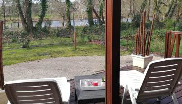 Chalet 19 Cosy bord de Lac, dans domaine avec piscine couverte accueil 4 voyageurs LOUMAELOU - Foto 5, Garden view