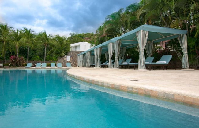 Luxe! Impressively designed 2nd-floor unit in Coco done in red and orange hues - Photo 6