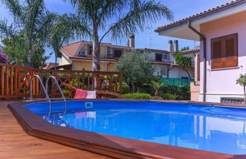 VILLA NEVADA Esclusiva con PISCINA Privata, Il Tuo Angolo di Pace a 5 Minuti dal MARE e 20 Minuti da ROMA - Photo 21