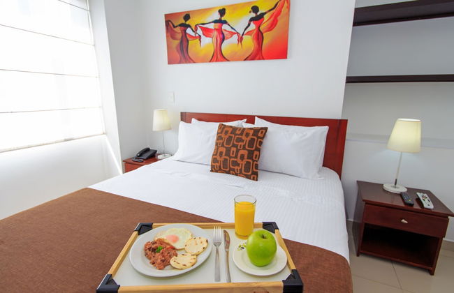 122 Plaza Apartahotel - Photo 7