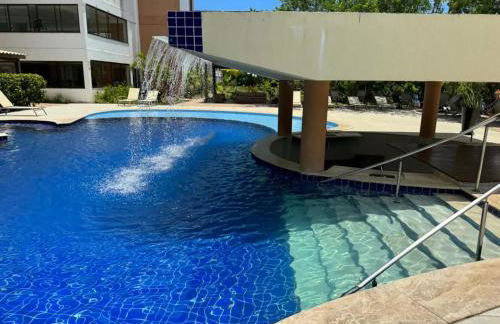 GUARAJUBA PARAÍSO DAS ÁGUAS - APT 2 quartos com AR e TV em TODOS os cômodos - Incluso Roupa de CAMA e BANHO - Filtro de Água Gelada e Maquina de Lavar dentro do APT - TOTAL CONFORTO PARA VC E SUA FAMILIA - Cond A beira da Lagoa e perto da PRAIA - Foto 5