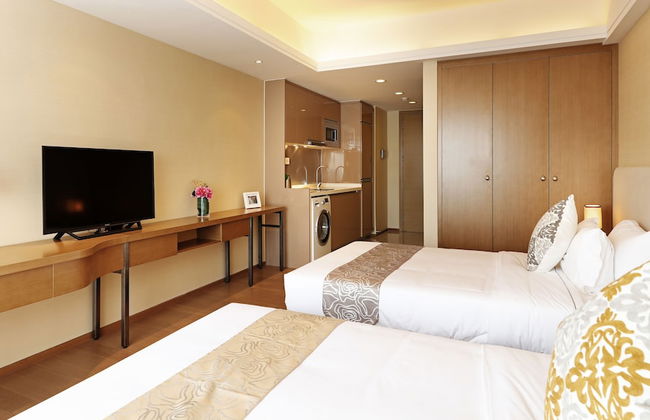 Yuwa Serviced ApartHotel - Photo 9