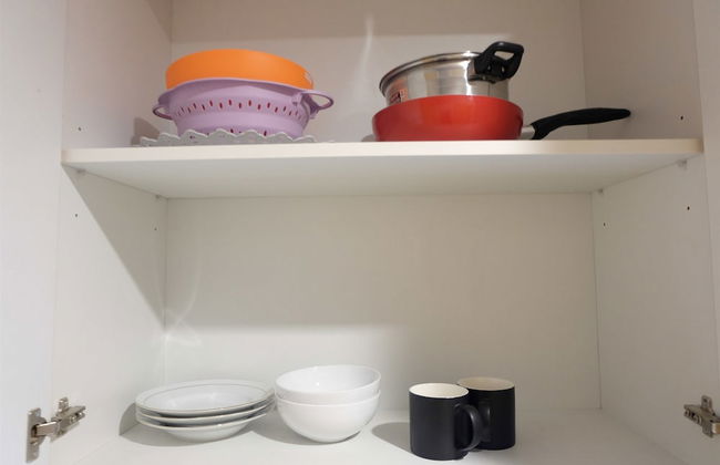 Homey Studio Room at Capitol Suites - Foto 24