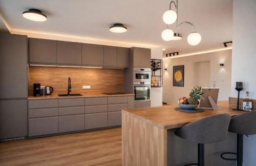 Exklusives Penthouse mit Whirlpool, Panoramaterrasse, Kino & Tischfußball für bis zu 8 Personen - Foto 4