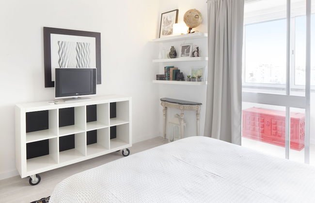 Prime Apartments White and Yellow - Photo 4