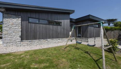 6 The Dunes At Upton Towans - Short walk to the beach - Hot Tub - Free Wi-Fi - Foto 5, Garden