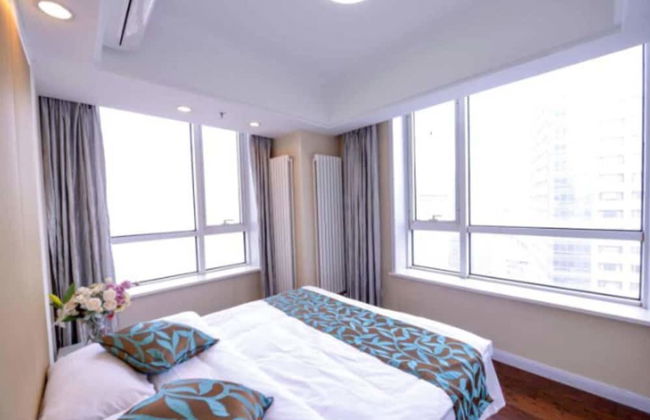 Dalian Yijia Apartment Sanba Square - Foto 15