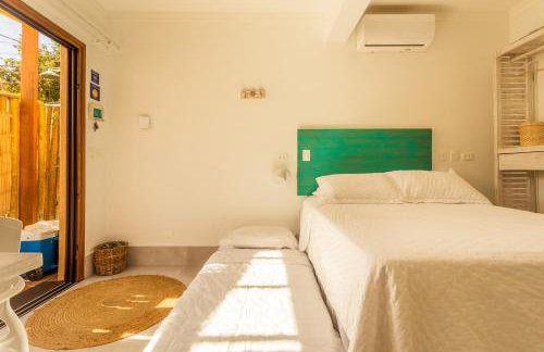 Casa d'Aroeira Residencial Boutique - Centro de Juqueí - Perto de Tudo - 2 quadras do Mar - Serviço de Praia - Roupa de Cama 600 fios algodão Egípcio - Tudo Novo - Estacionamento Interno - Cozinha - Consulte unidades com Ofurô Hidro e Cromoterapia - Foto 41