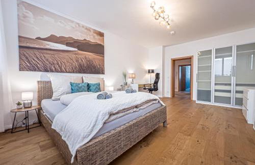 Gemütliche Ferienwohnung mit 2 Schlafzimmern, kostenfreiem Parkplatz, modernem Bad, Küche, Waschmaschine & Trockner - Foto 6