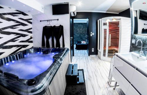 Appart Hotel GLAM88 Suites SPA et SAUNA - Foto 5