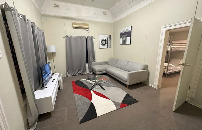 Cottage Charm with Nearby Shopping - Photo 10