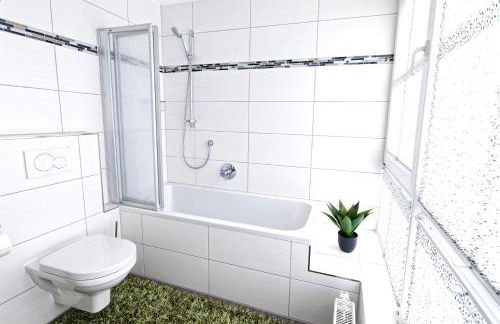 Exklusives Penthouse mit Dachterrasse, hochwertig ausgestatteter Küche mit Dampfgarer, inklusive 2 Stellplätze und Fahrradgarage - Foto 22