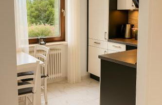 Modernes Apartment mit 180° Bergblick - Photo 3