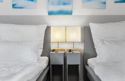 DG - Einfach aber sehr komfortabel - Wohnung für bis zu 12 Personen - Gruppen, Messe, Monteure, Studenten - Voll ausgestattet - 3 Smart-TV 55 Zoll Netflix, 1000 Mbit WLAN, voll ausgestattete Küche - Foto 11