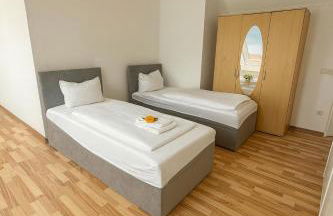 SUNNYHOME Monteurwohnungen und Apartments in Nittendorf - Foto 19