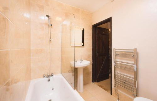 Smithy Cottage at Lower Aylescott - Foto 8