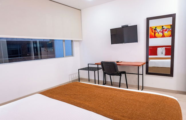 122 Plaza Apartahotel - Photo 17