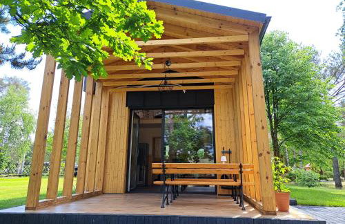 Domki przy jeziorze z prywatną plażą w Borach Tucholskich Pensjonat Alicja wczasy z dziećmi nowe luksusowe domki na skraju jeziora i lasu - Foto 2