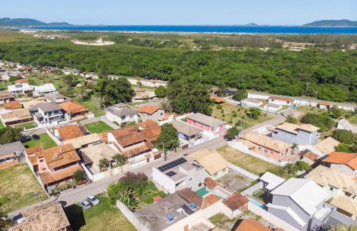 Refúgio Tropical Casa de Praia com Piscina e 4 Suítes e garagem 3 carros, 800 mtrs da praia internet 700 mbps, condomínio privado com pista de skate , quadra de futevôlei , campos e quadras de futebol! - Foto 51