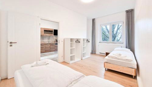 Tolstov Apartments - City Apartments with 1 or 2 Rooms - 15 Min to Messe DUS and Old Town DUS - Foto 5, wardrobe