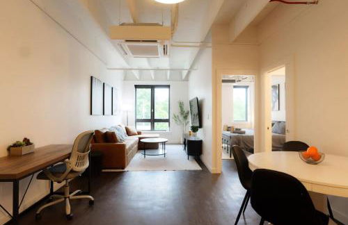 Above The Roots - Sophisticated 1BD Retreat - Photo 13