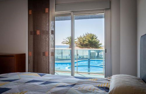 AT021 Apartment with pool in front of the beach - Foto 11