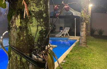 Casa com Piscina, Churrasqueira e Quartos amplos - Foto 8