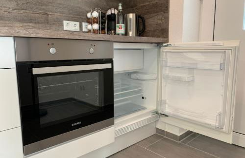 Top Modernes 1-Zimmer-Apartment mit Küche, Parkplatz, kostenfreiem WLAN und Netflix - Foto 16