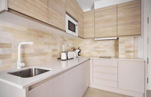 Slow Home Apartments - Photo 8