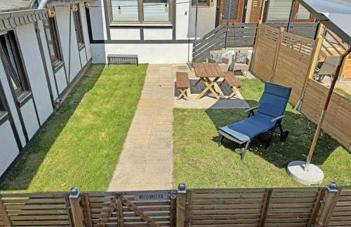 FeWo Wellenreiter direkt am Strand mit Meerblick und eingez Garten - Photo 3