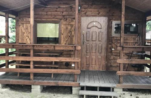 Domek nad jeziorem Wilczyńskim dla czterech osób, sypialnia z łożem małżeńskim oraz salon z rozkładanym narożnikiem - Photo 28