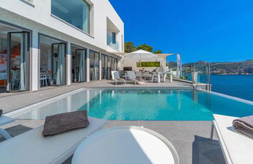 Can Ema, villa moderna con piscina frente al mar - Foto 31