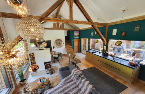 stylische Alpenlounge mit Pool, Blockhaus-Sauna und Jacuzzi für bis zu 12 Personen - Foto 1