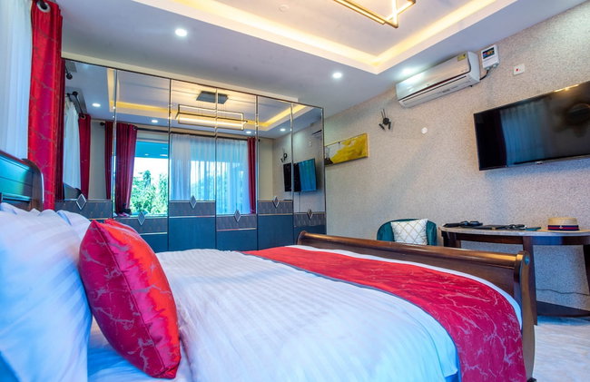 Lux Suites Hayana Palm Apartments - Photo 12