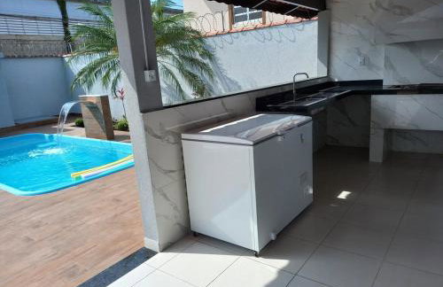 Bertioga - Casa para temporada com piscina, acomoda até 15 pessoas - Photo 6
