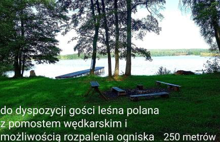 Dom z pięknymi widokami na jezioro ryńskie ilasy. - Foto 26