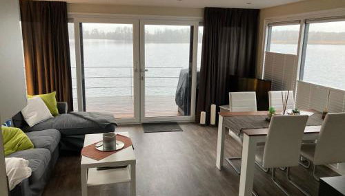 Schwimmende Ferienwohnung, Hausboot Urlaub als Festlieger am Steg - Foto 3