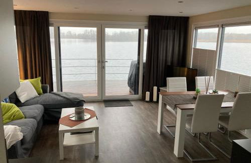 Schwimmende Ferienwohnung, Hausboot Urlaub als Festlieger am Steg - Foto 3