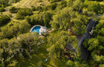 Hill country gem with private pool, deck, firepit, Ping-Pong, foosball, & WiFi - Photo 79
