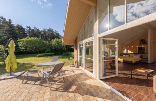 Wildgans - Stilvolles Ferienhaus mit Terrasse, Seeblick & Naturidylle am Loppiner See - Foto 4