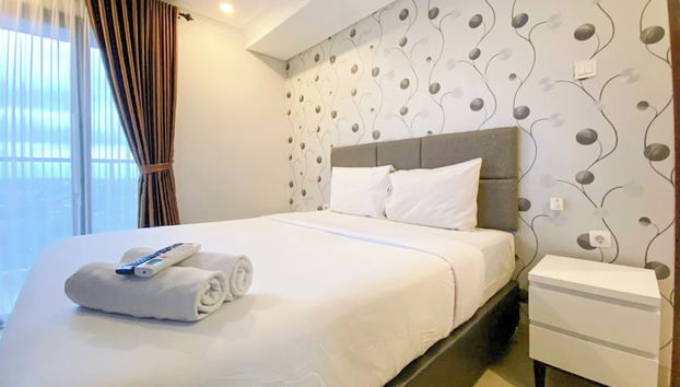 Restful And Elegant 1Br Patraland Amarta Apartment - Foto 2, Habitación