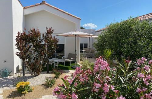 La petite maison zone coulée verte menant a l'océan - Photo 1