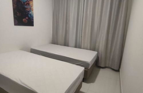 Apartamento novo a 350 m da praia das Toninhas em Ubatuba - 2 dormitórios sendo 1 suite, piscina, varanda gourmet com churrasqueira, ar condicionado, cozinha completa, garagem privativa - Foto 34