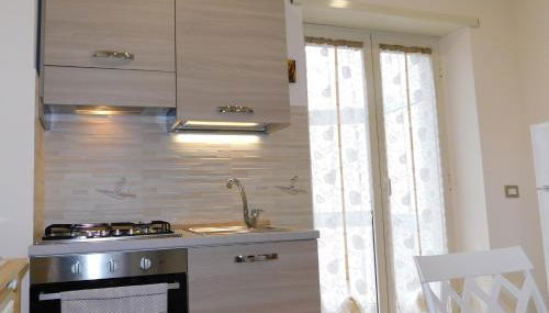 Cariteo Home - Photo 4, stove