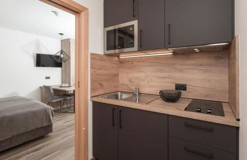 Aparthotel Familiaris - Family Apartments - Pools & Spa in Dolomites - Foto 27