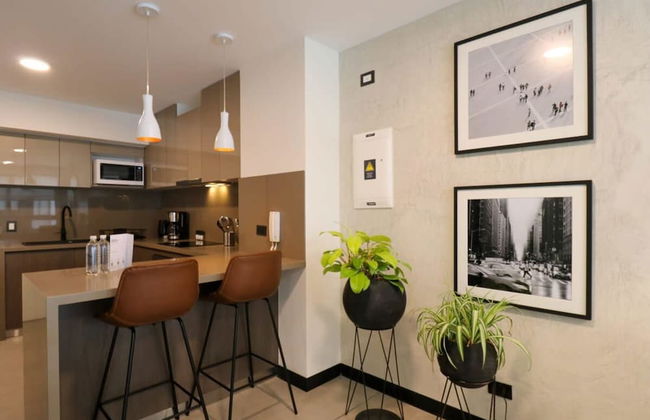 w Captivating 1BR in San Isidro - Photo 3