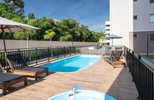 Apartamentos em Bal Piçarras 150 M DA PRAIA com SACADA, WI-FI, PISCINA, PORTARIA 24h, PLAYGROUND e vaga de GARAGEM - Foto 7