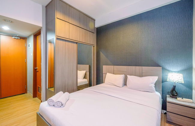 Cozy Living and Homey Studio Apartment at Margonda Residence 5 - Photo 1